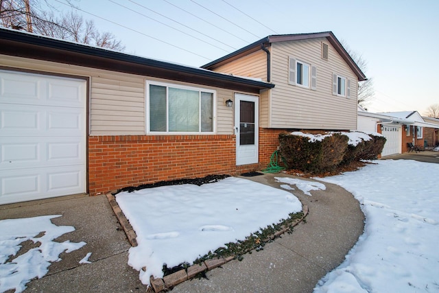 tri-level home featuring a garage