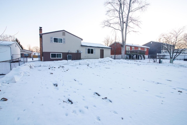 view of snow covered house