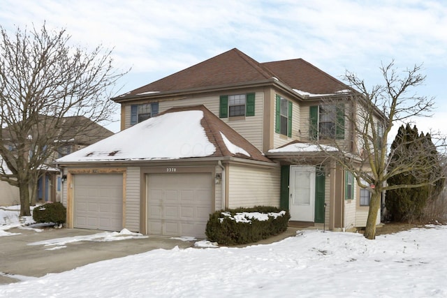 view of front of property featuring a garage