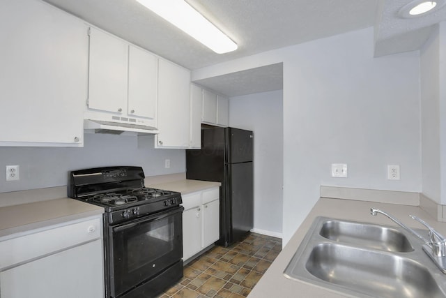 kitchen with sink, a textured ceiling, white cabinets, and black appliances