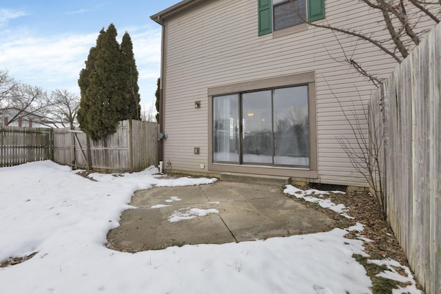 view of snow covered property