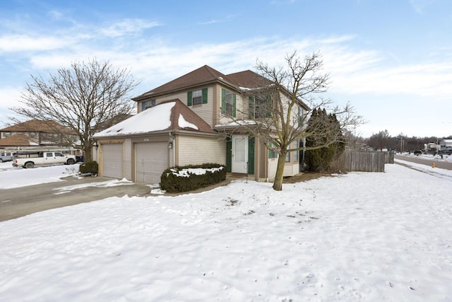 view of front of property with a garage