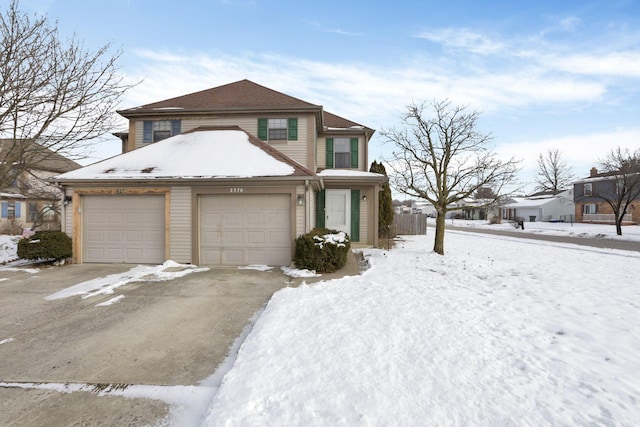 front of property featuring a garage