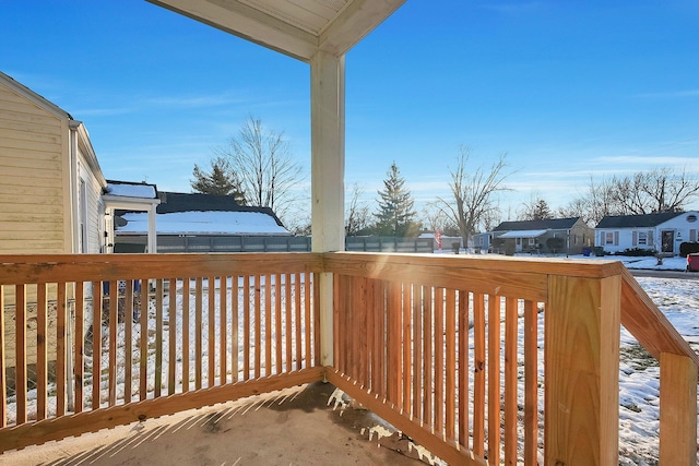 view of snow covered deck