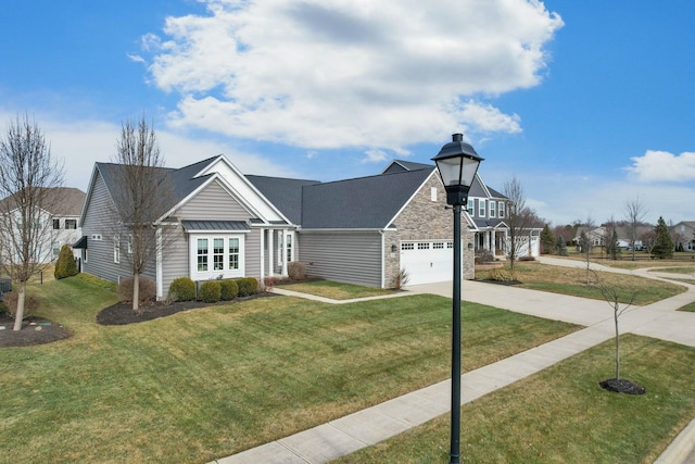 view of front facade featuring a garage and a front yard