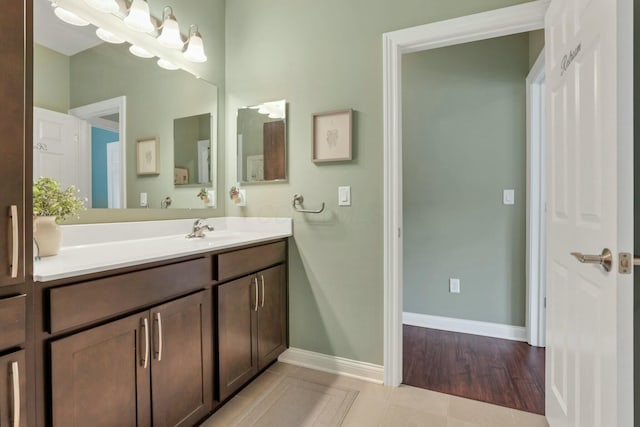 bathroom featuring vanity and tile patterned flooring