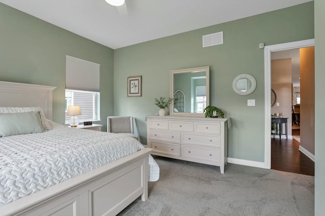 carpeted bedroom with ceiling fan