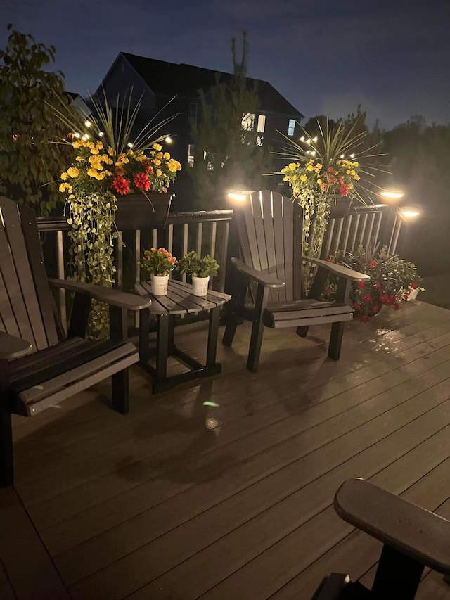 view of deck at twilight