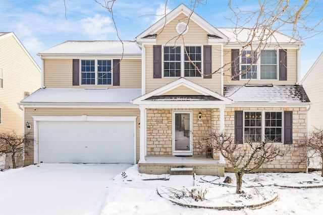 view of front of property featuring a garage