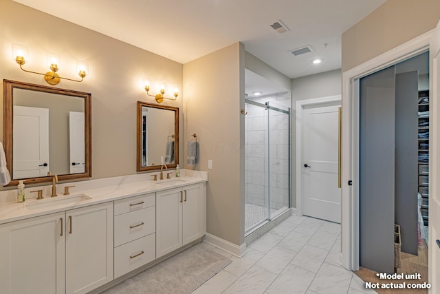 bathroom featuring walk in shower and vanity