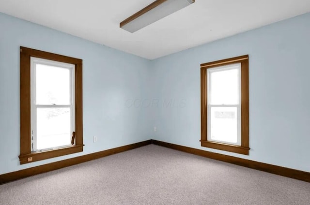 view of carpeted spare room