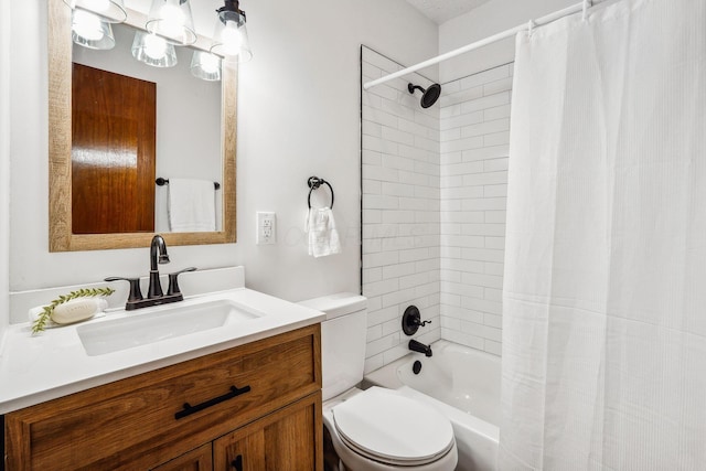 full bathroom featuring toilet, vanity, and shower / bath combo