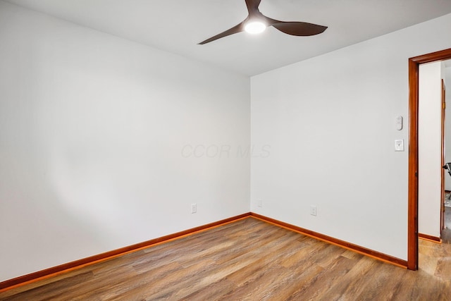 unfurnished room featuring ceiling fan and light hardwood / wood-style flooring