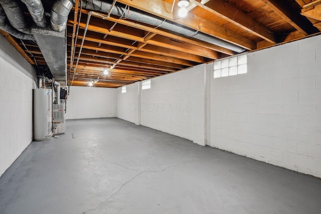 basement featuring gas water heater