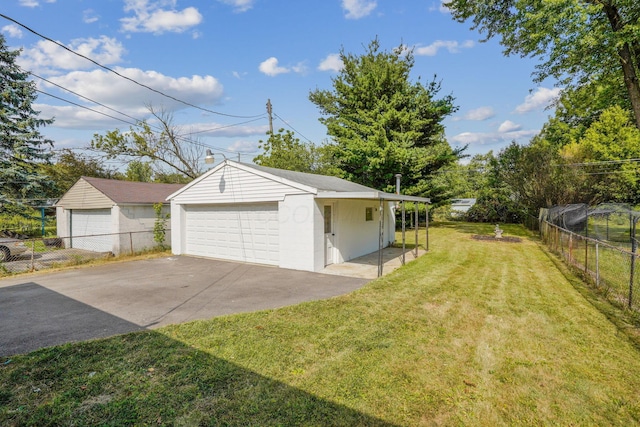 garage with a yard