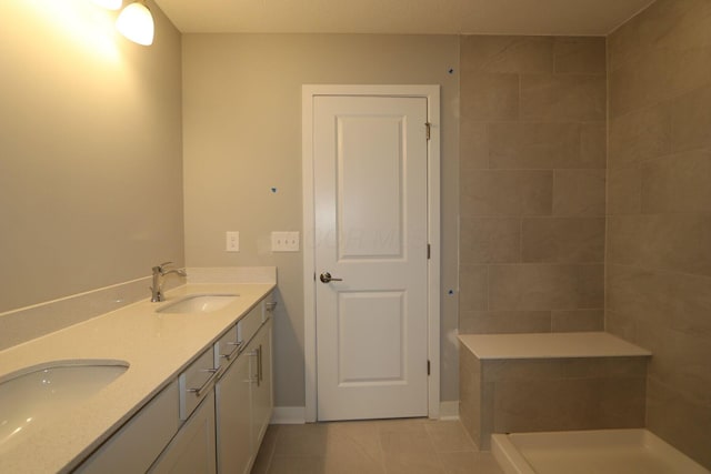 bathroom with vanity and tile patterned flooring