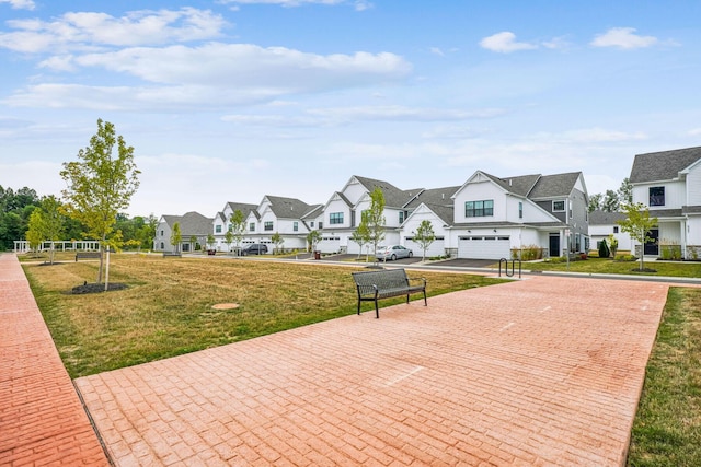 view of community featuring a yard