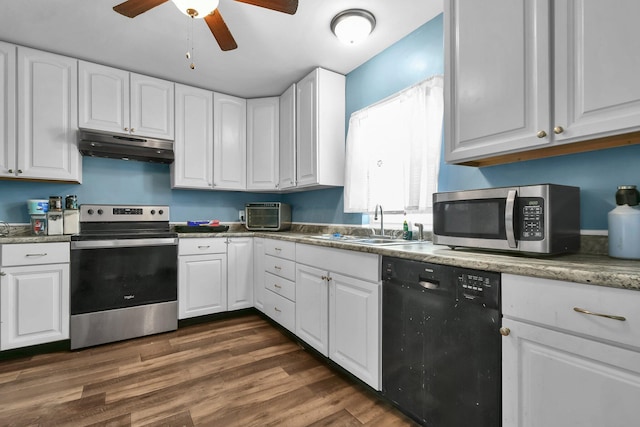 kitchen with ceiling fan, white cabinets, appliances with stainless steel finishes, and dark hardwood / wood-style floors