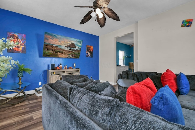 living room with ceiling fan and wood-type flooring