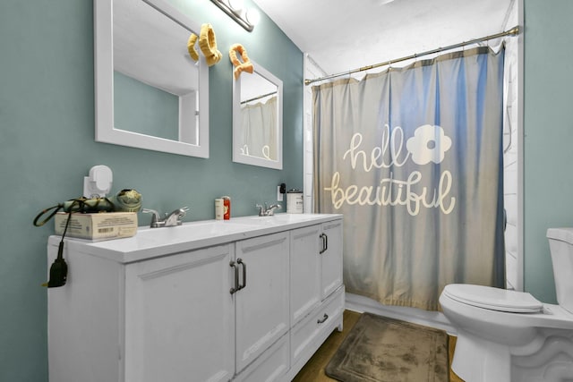 full bathroom featuring toilet, vanity, and shower / bath combination with curtain