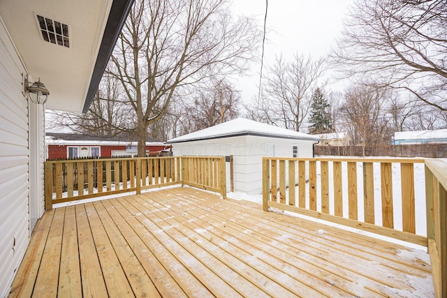 view of snow covered deck