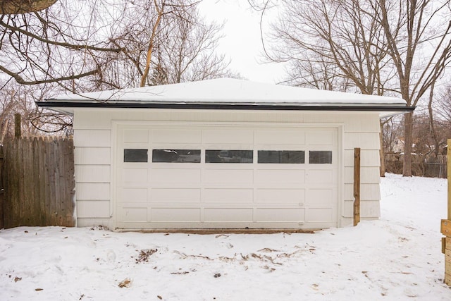 view of snow covered garage