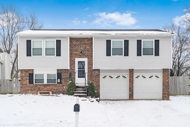 bi-level home featuring a garage