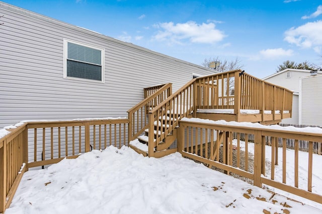 view of snow covered deck