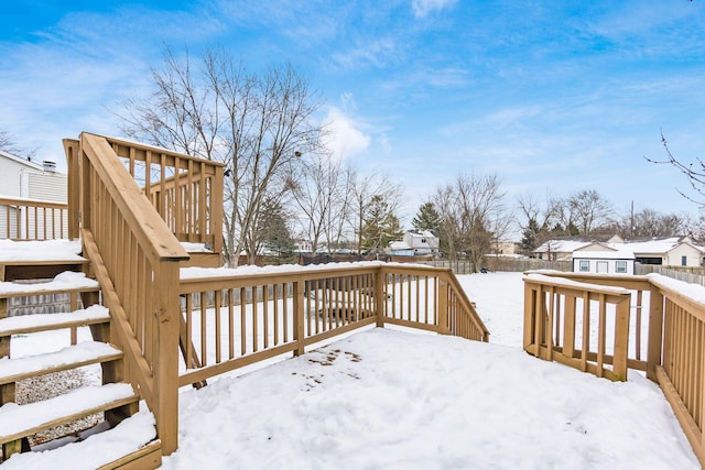 view of snow covered deck