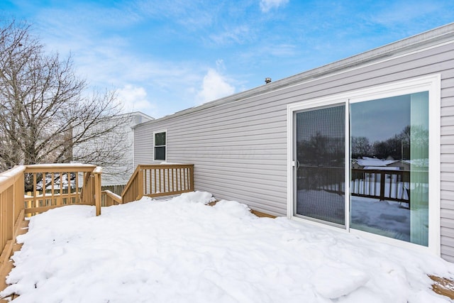 view of snow covered deck