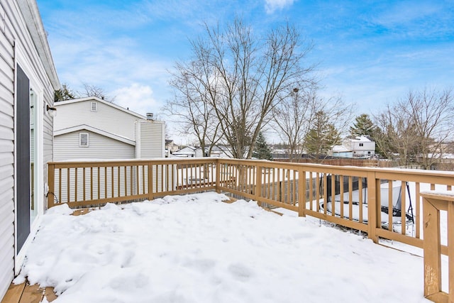 view of snow covered deck