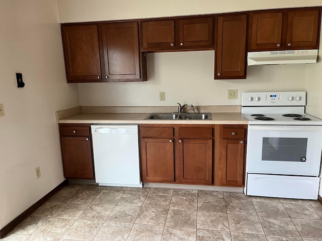 kitchen with sink and white appliances