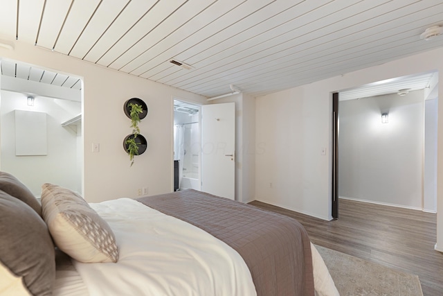 bedroom featuring hardwood / wood-style floors