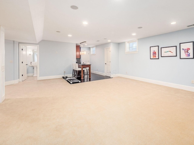 basement with light colored carpet