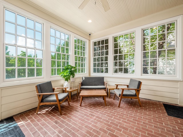 sunroom / solarium with ceiling fan