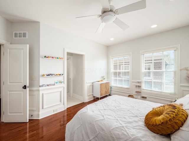 bedroom featuring ceiling fan and wood-type flooring