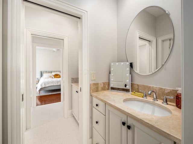 bathroom with vanity and tile patterned flooring