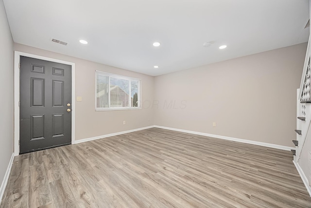 entryway with light wood-type flooring