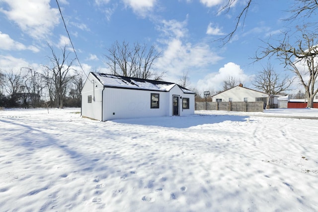 view of snow covered property