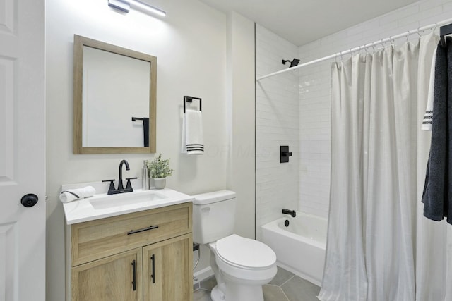 full bathroom featuring vanity, tile patterned flooring, toilet, and shower / bath combo with shower curtain