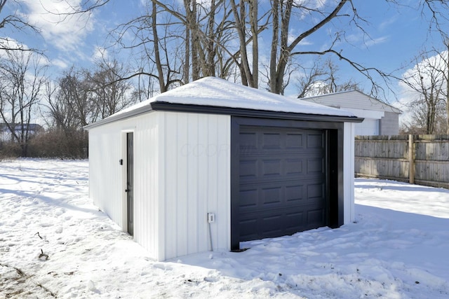 view of snow covered garage