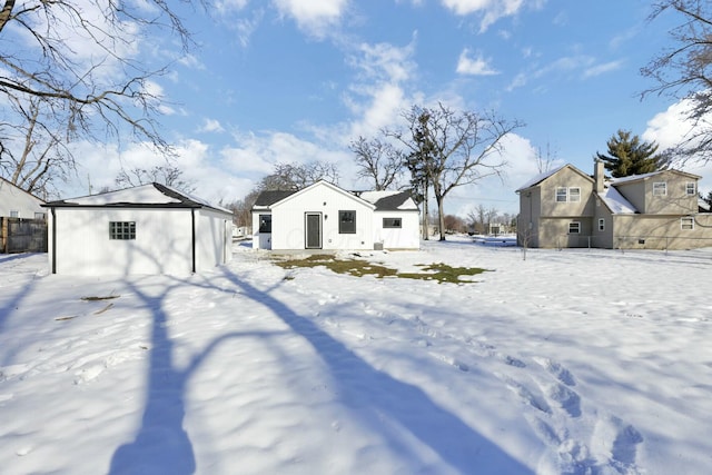 view of yard layered in snow