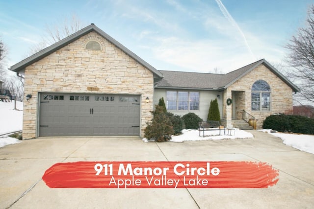 ranch-style house featuring a garage