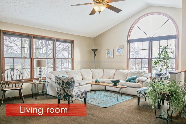 carpeted living room with lofted ceiling, a textured ceiling, and ceiling fan