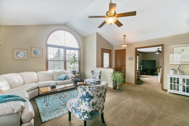 carpeted living room featuring vaulted ceiling and ceiling fan