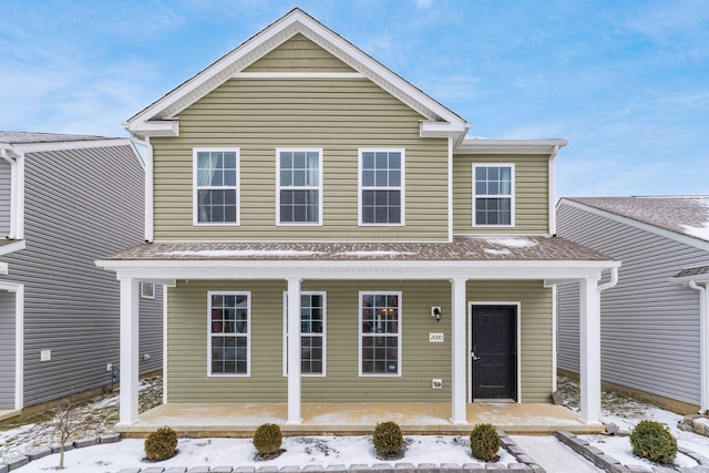 front of property featuring covered porch