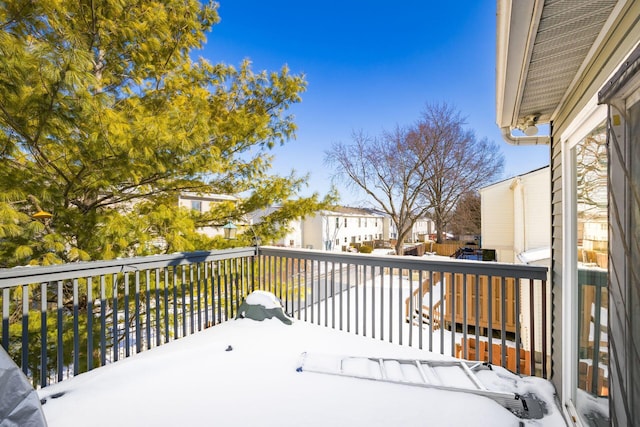 view of snow covered deck