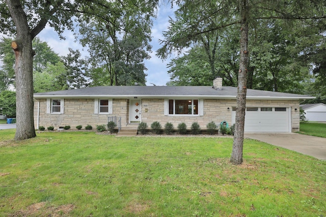 ranch-style home featuring a garage and a front yard