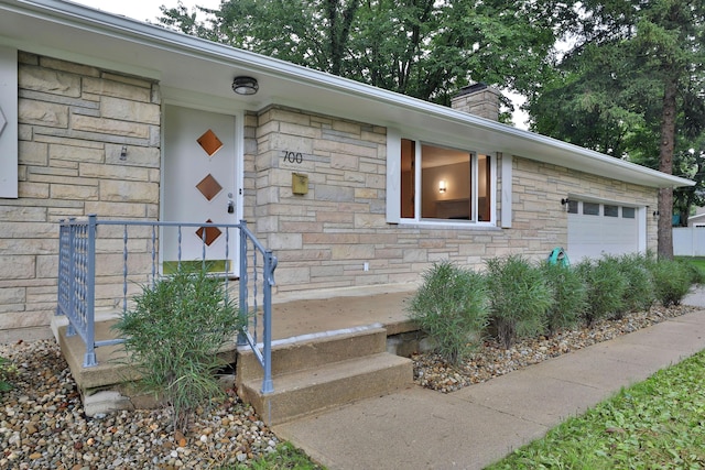 entrance to property with a garage