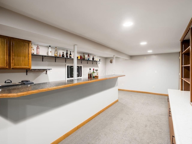 bar featuring light colored carpet